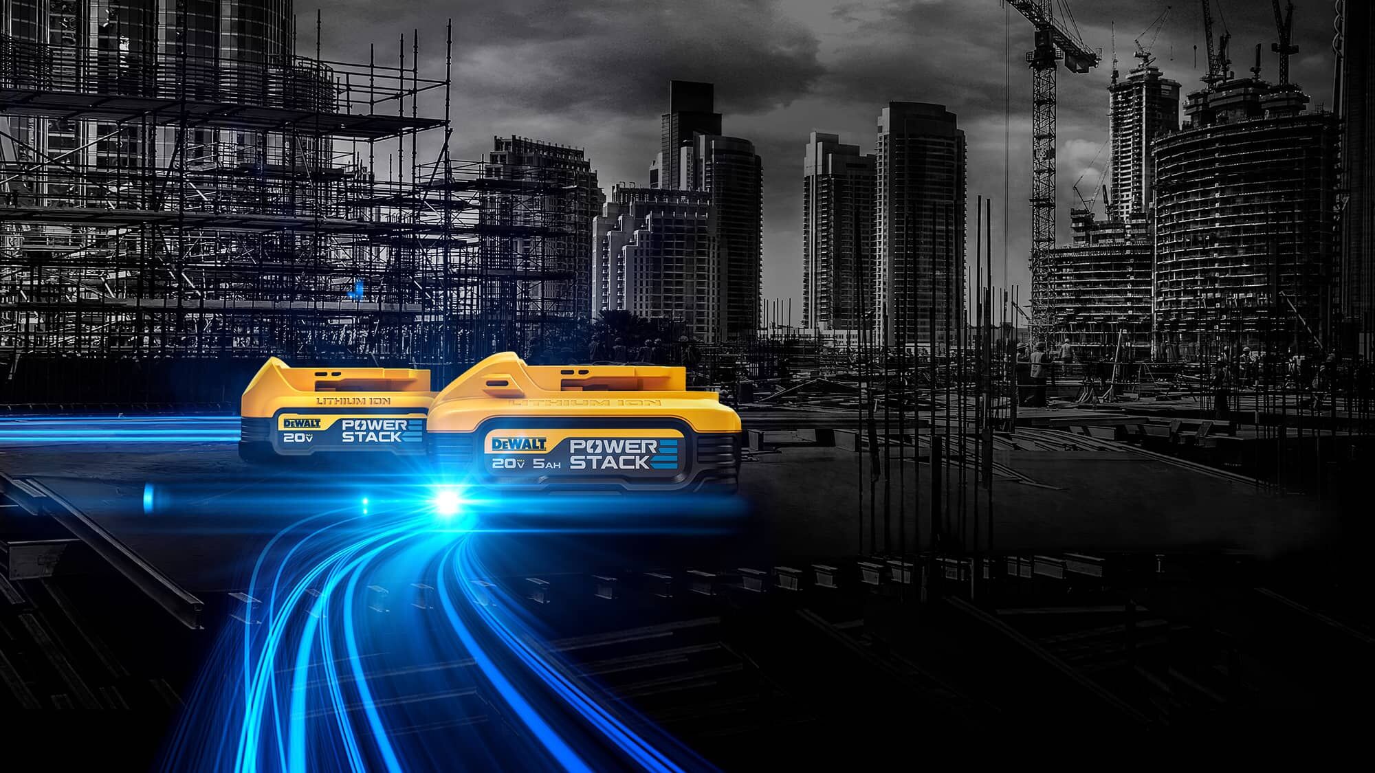 commercial construction site with dewalt powerstack five amp hour battery and compact battery with blue starlight coming out 