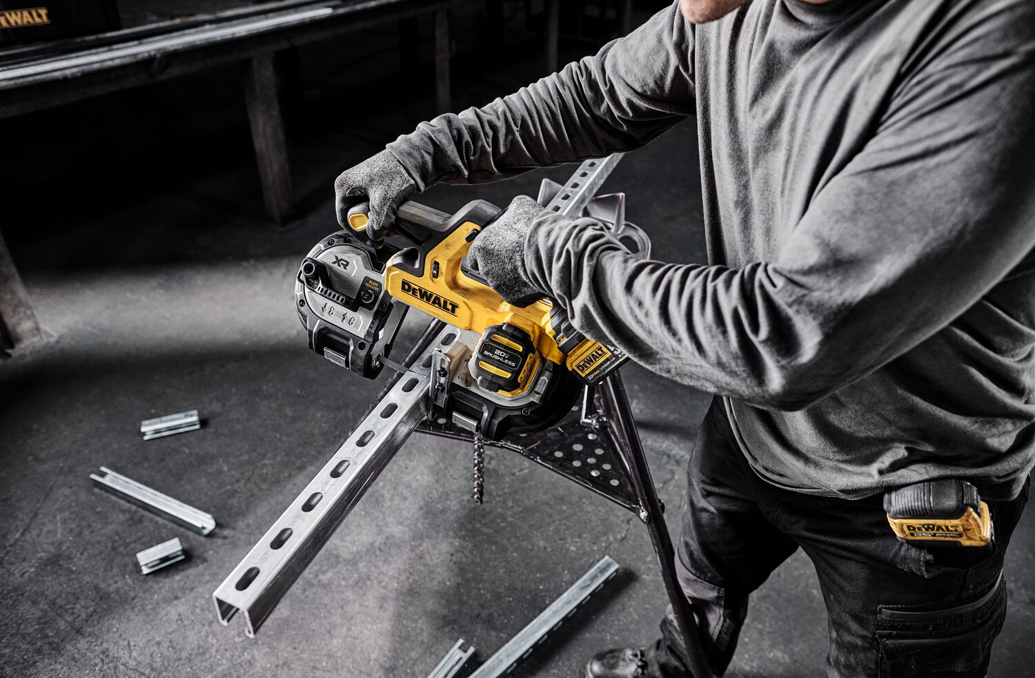 DEWALT Single Trigger Bandsaw is used to cut strut from a pipe stand in a mechanical room.